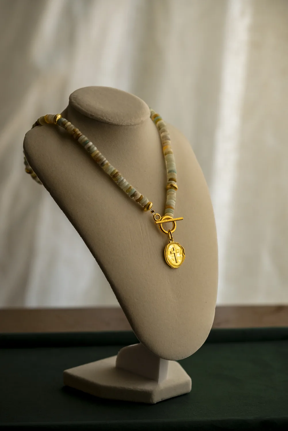 The Faith, soft multicolor beads with a cross charm